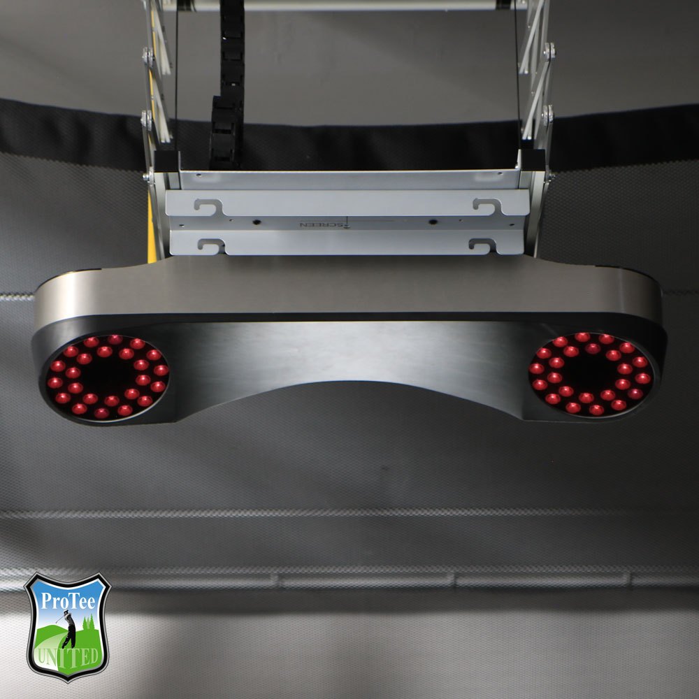 The ProTee VX mounted overhead in a simulator bay, both camera arrays lit red